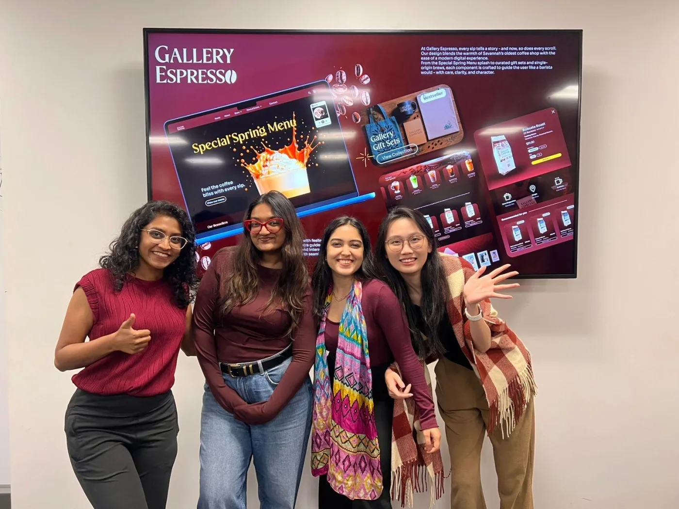 Navyaa with her team in front of their Gallery Espresso design.