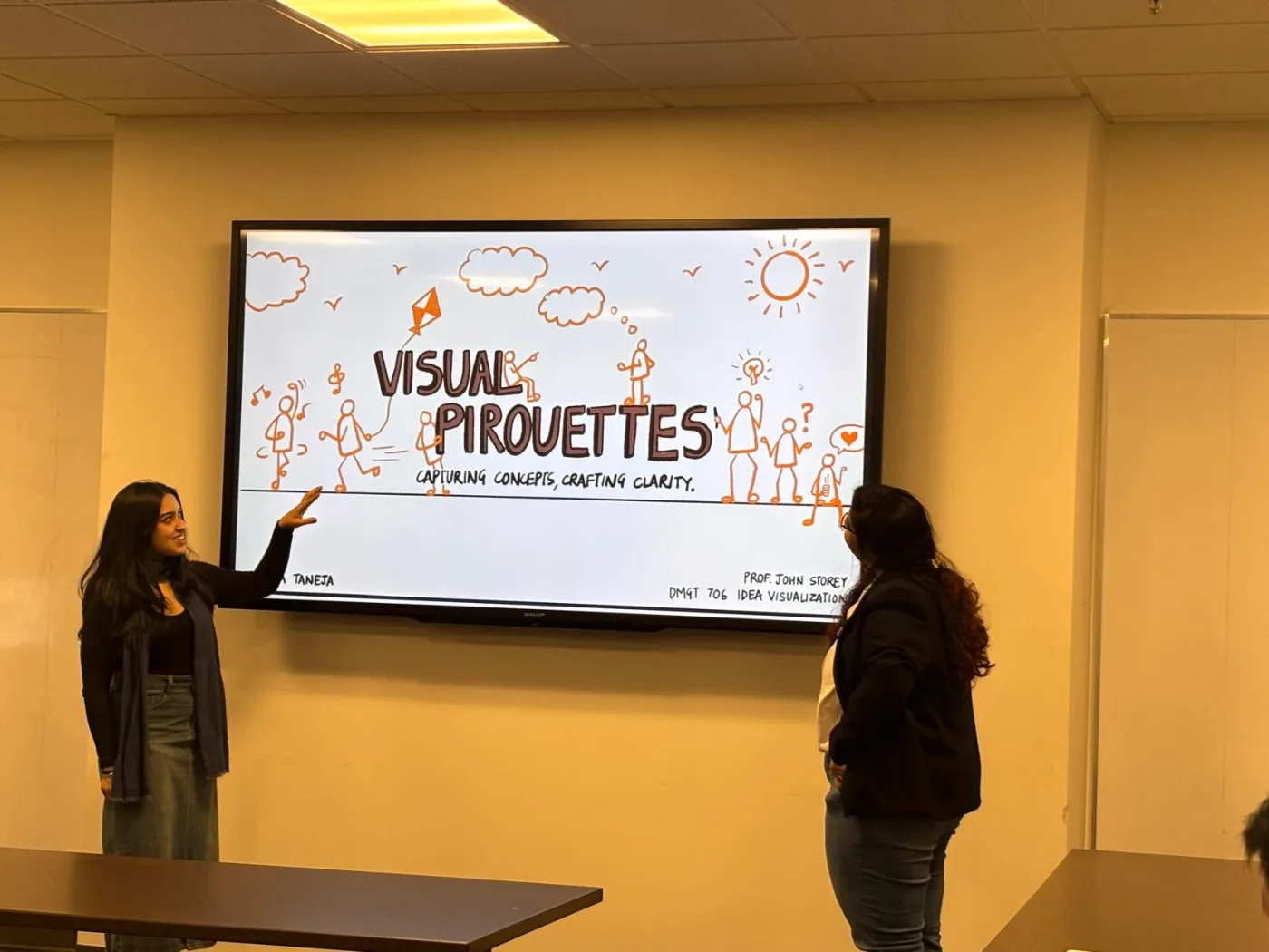 Navyaa presenting her Visual Pirouettes project on a screen.