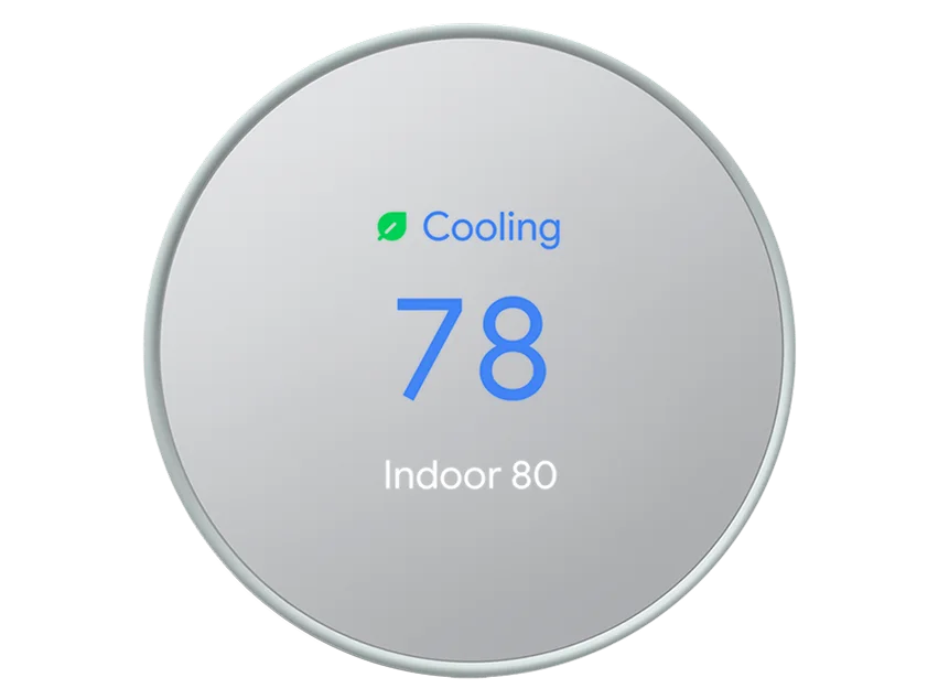 The current Google Nest Thermostat: a round silver dial reading Cooling, 78, Indoor 80.